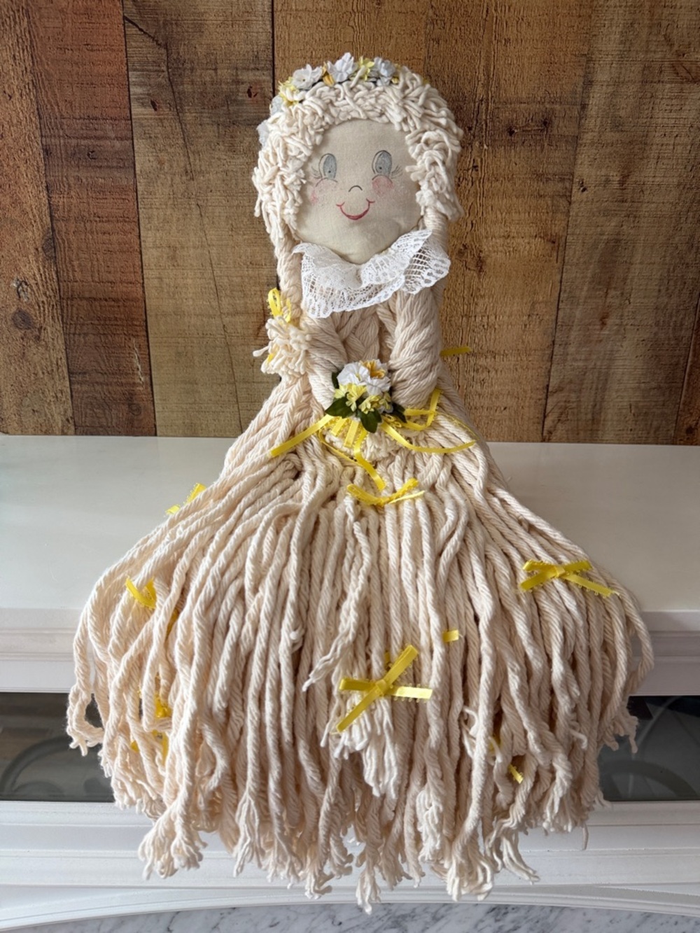 Handcrafted Folk Art Mop Doll with Yellow Ribbon Accents with Doll Stand